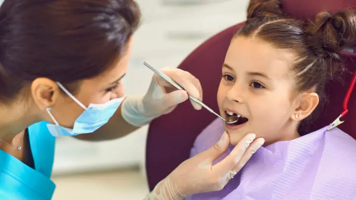 Girl getting her teeth done