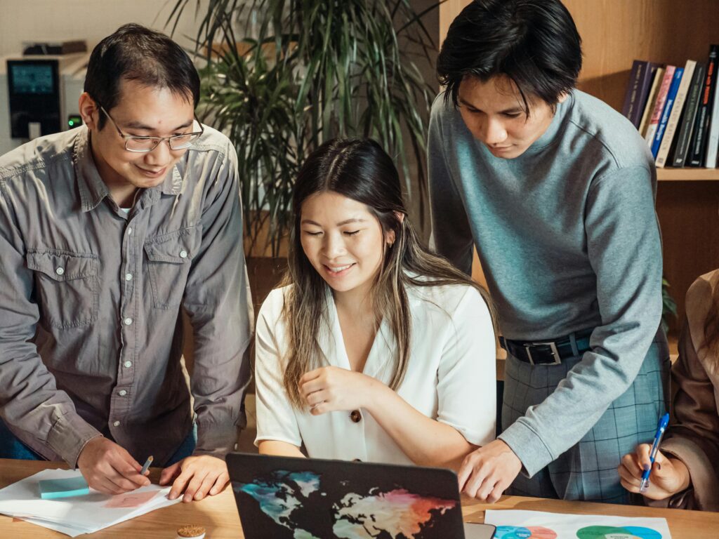 People Working Together on the Laptop