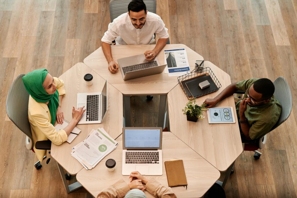 Photo of People Having a Meeting at the Office