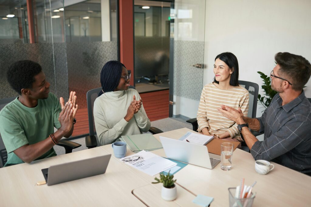 A Group of People Having a Meeting in the Office